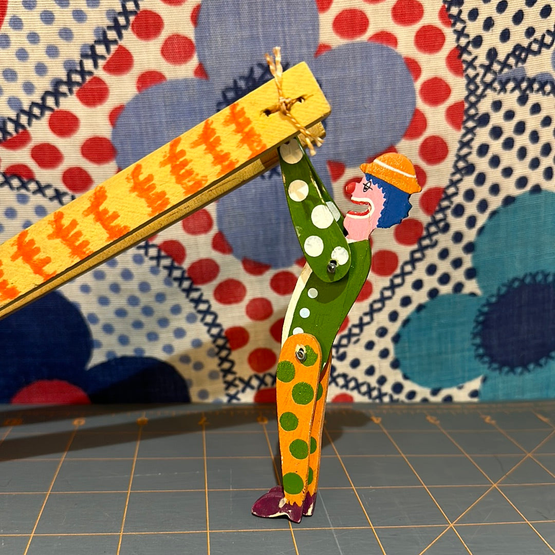 Swinging Painted Wood Clown Toy, 9" overall