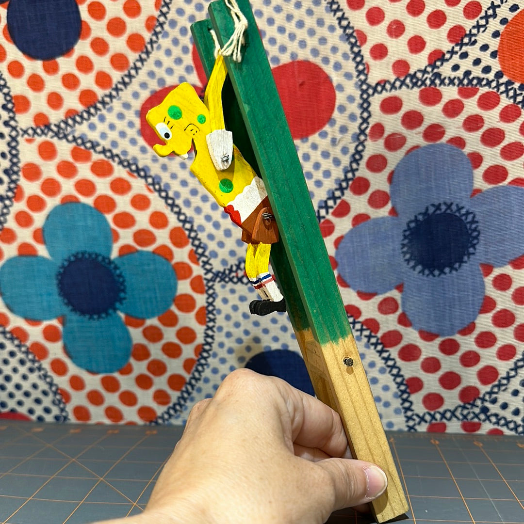 Swinging Painted Wood Sponge Bob Toy, 9" overall