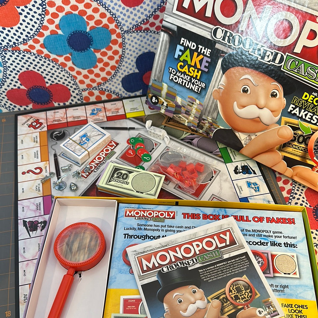MONOPOLY Crooked Cash Board Game